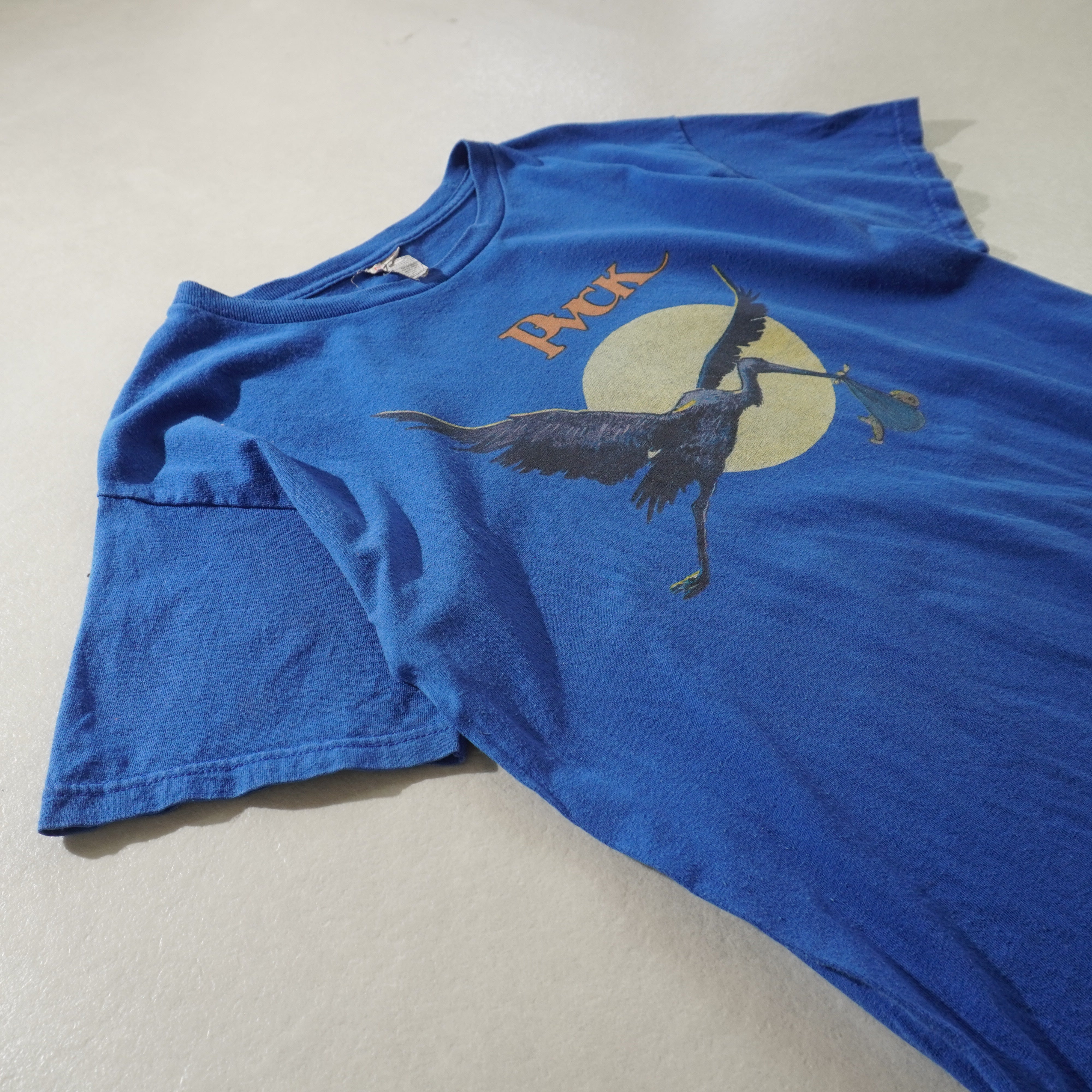 stork tee blue size XL